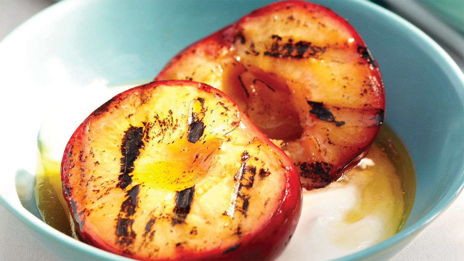 grilled plums with yogurt and spiced maple syrup
