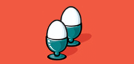 two eggs in stands